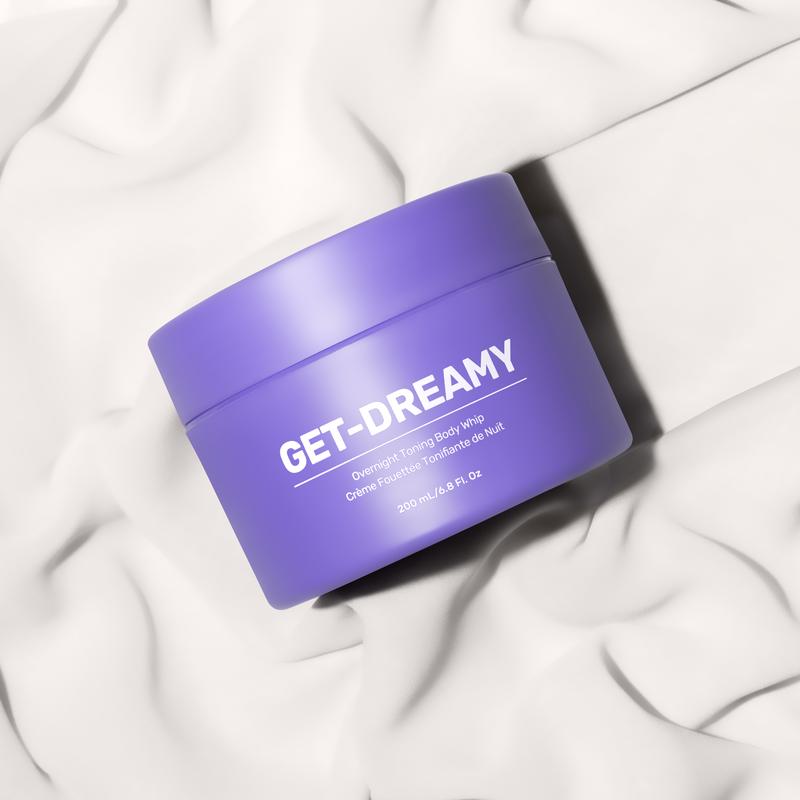 GET-DREAMY overnight toning body whip in purple jar displayed on soft white fabric