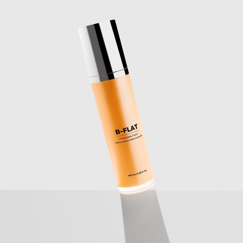 B-FLAT firming belly cream in tall orange bottle with reflective cap on minimalist background